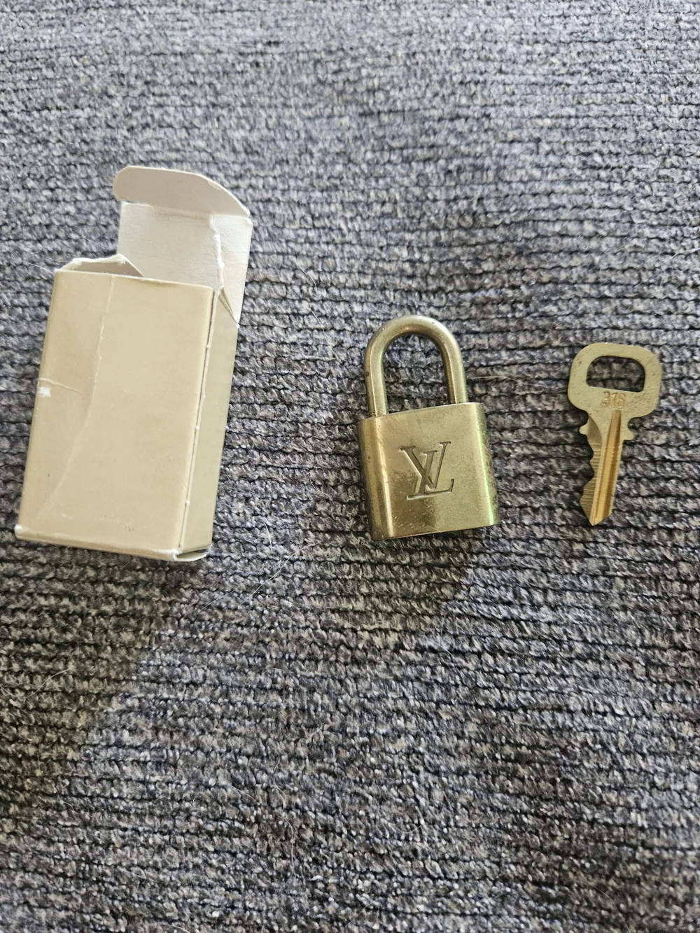 Louis Vuitton Gold Padlock and Key Set